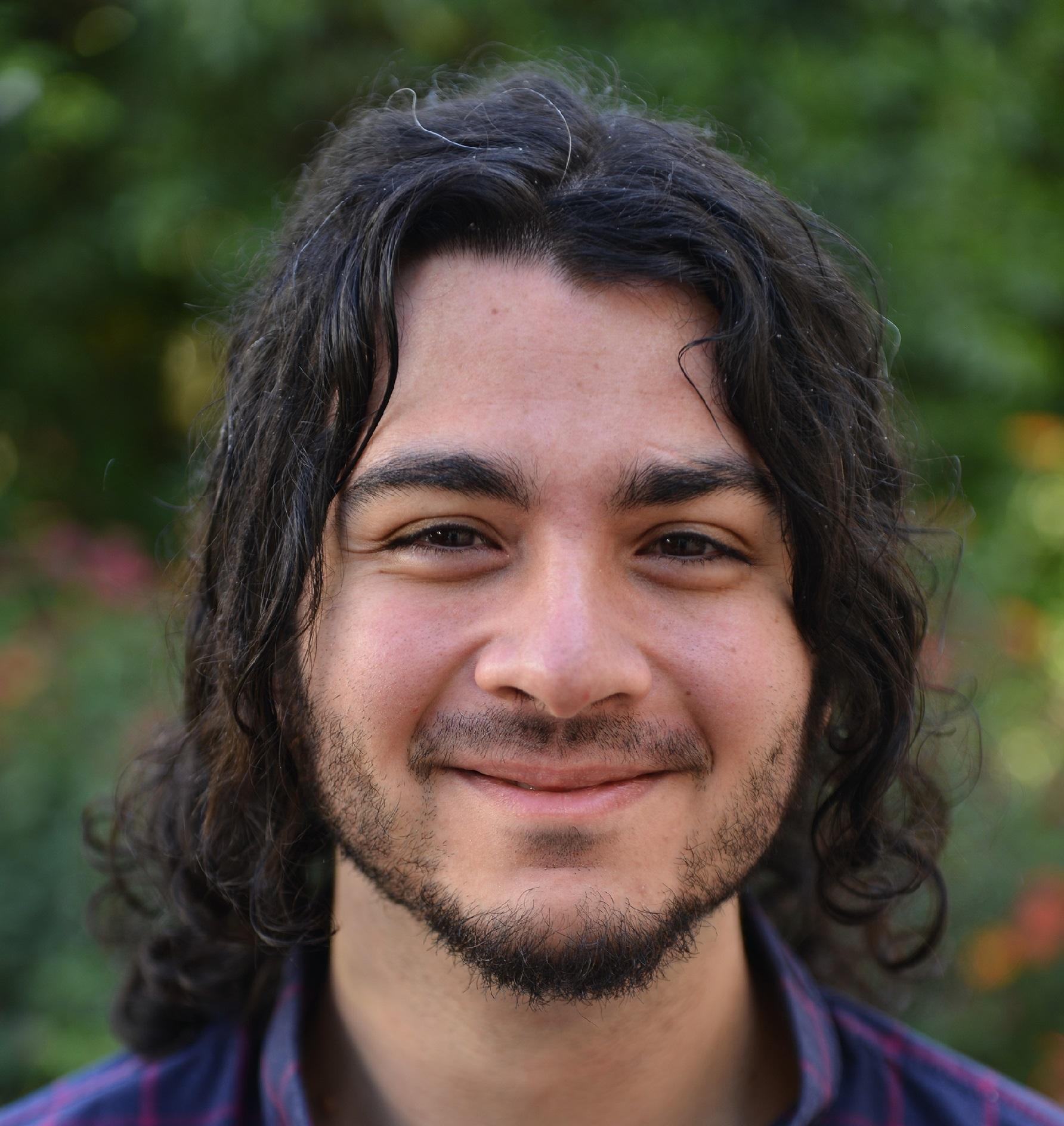 Deniz Arca's professional Headshot from the year 2017